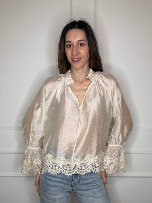 Blusa tinta unita con pizzo